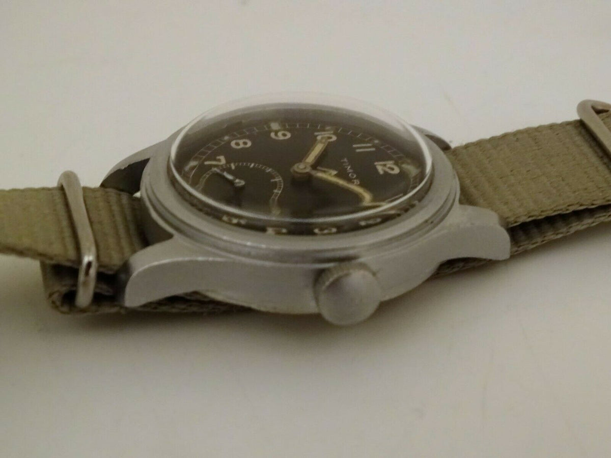 VINTAGE MILITARY TIMOR DIRTY DOZEN WWII cal 6060 circa 1943