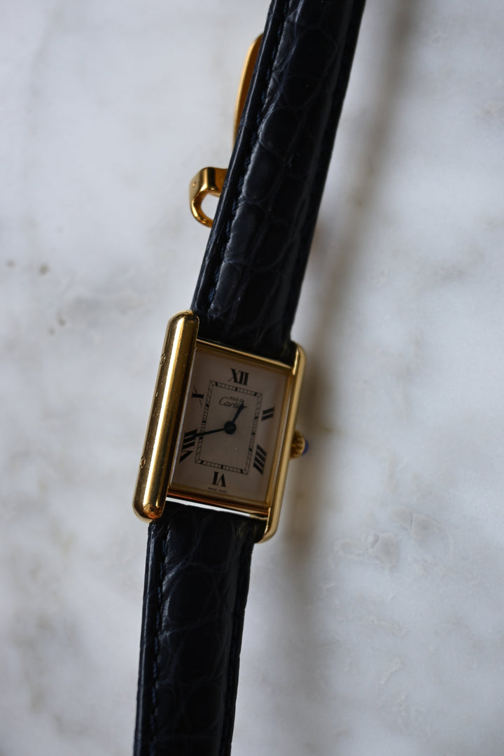 廃盤マスト ドゥ カルティエ タンク　ユニセックス ヴィンテージウォッチ 飛びローマン MMサイズ 純銀に18Kヴェルメイユ