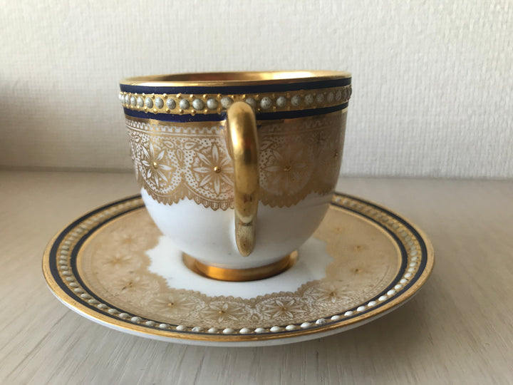 ロイヤルウースタージャポニズム　金彩の家紋とジュエルのデミタスカップ＆ソーサー