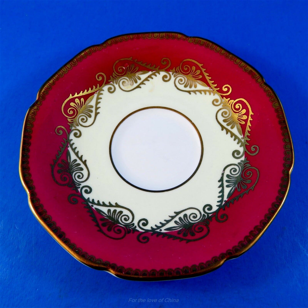 パラゴン　濃い赤とイエロー＆ゴールドの縁のカップ&ソーサー