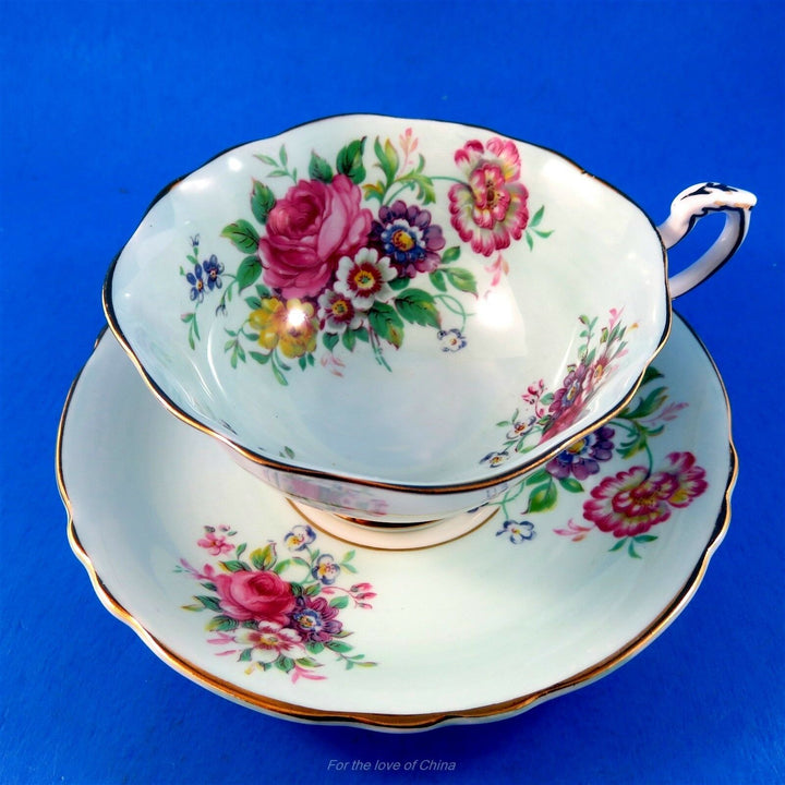 パラゴン　ライトブルー地に輝くフローラルブーケ　カップ&ソーサー