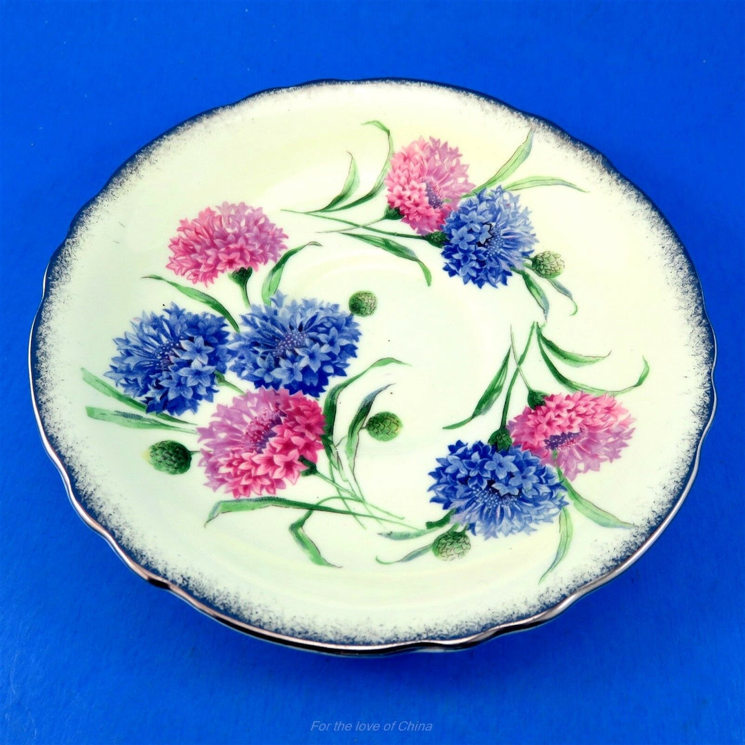 パラゴン　イエロー地に華麗なピンク＆ブルーのコーンフラワー　カップ&ソーサー