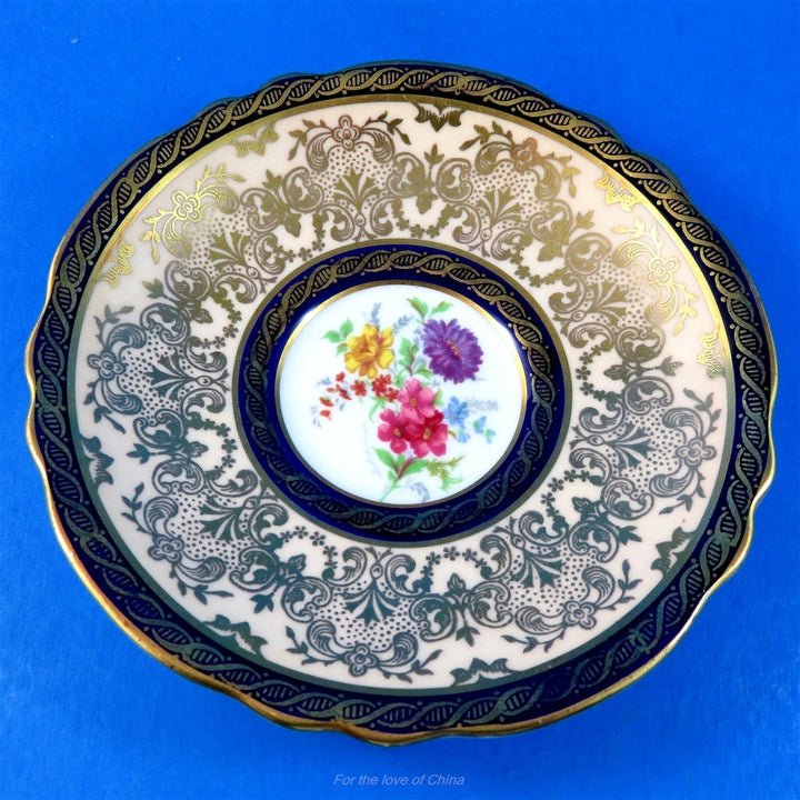 パラゴン　深いゴールドとコバルト縁の花柄カップ&ソーサー