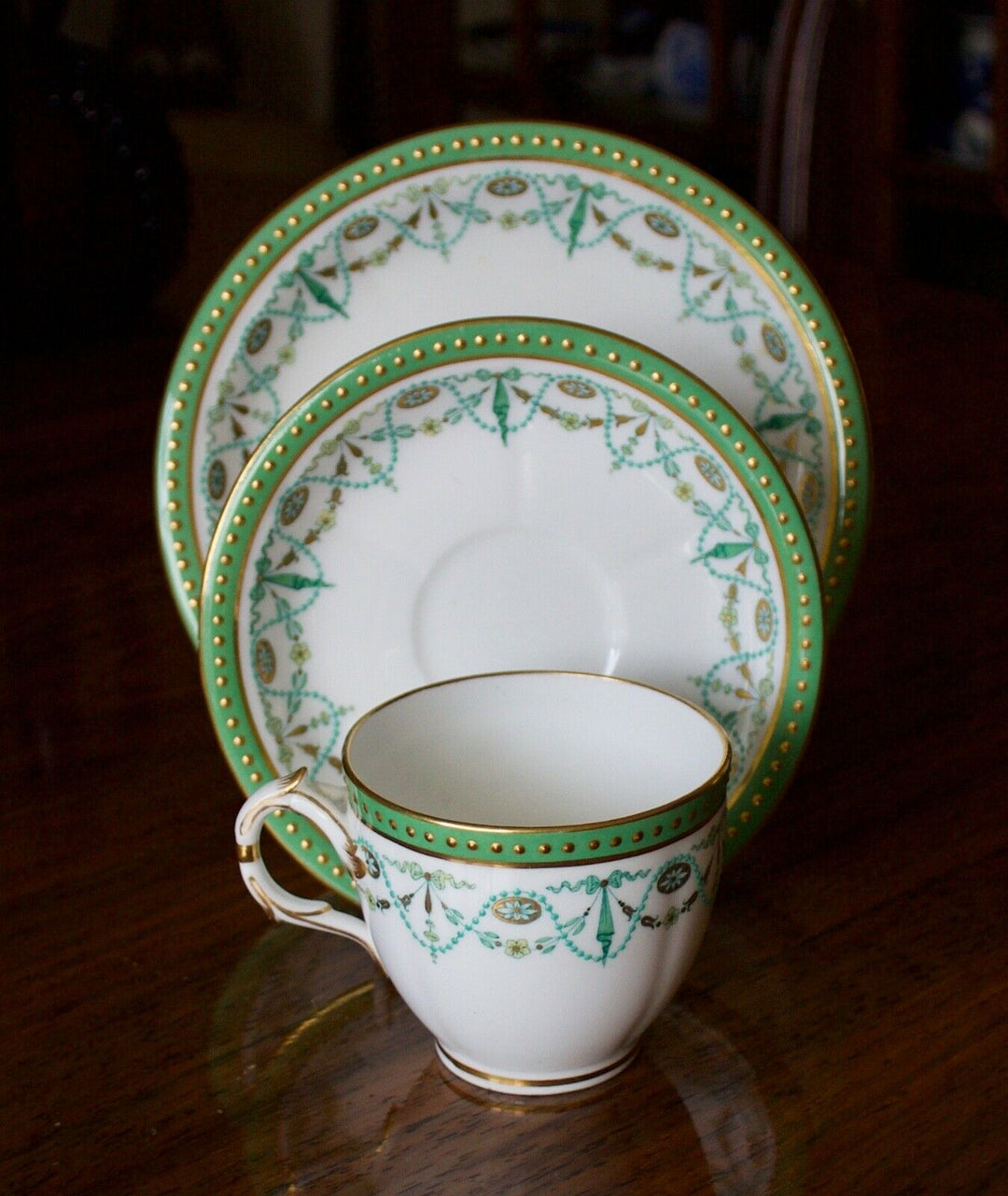 MINTON PORCELAIN TRIO - 1889 MARK - GREEN, GILT AND BLUE ENAMEL SWAGGING ETC.