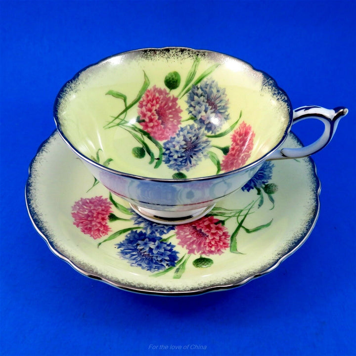 パラゴン　イエロー地に華麗なピンク＆ブルーのコーンフラワー　カップ&ソーサー