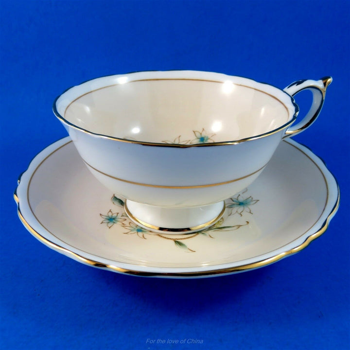 パラゴン　ピンク地に手描きの花模様のカップ&ソーサー