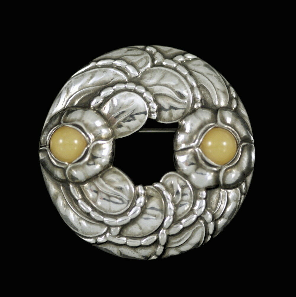Georg Jensen. Sterling Silver Anniversary Brooch with Amber #42