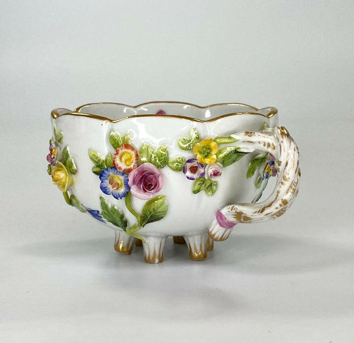 Meissen porcelain cup & saucer. Flower & Fruit encrusted, c. 1870.