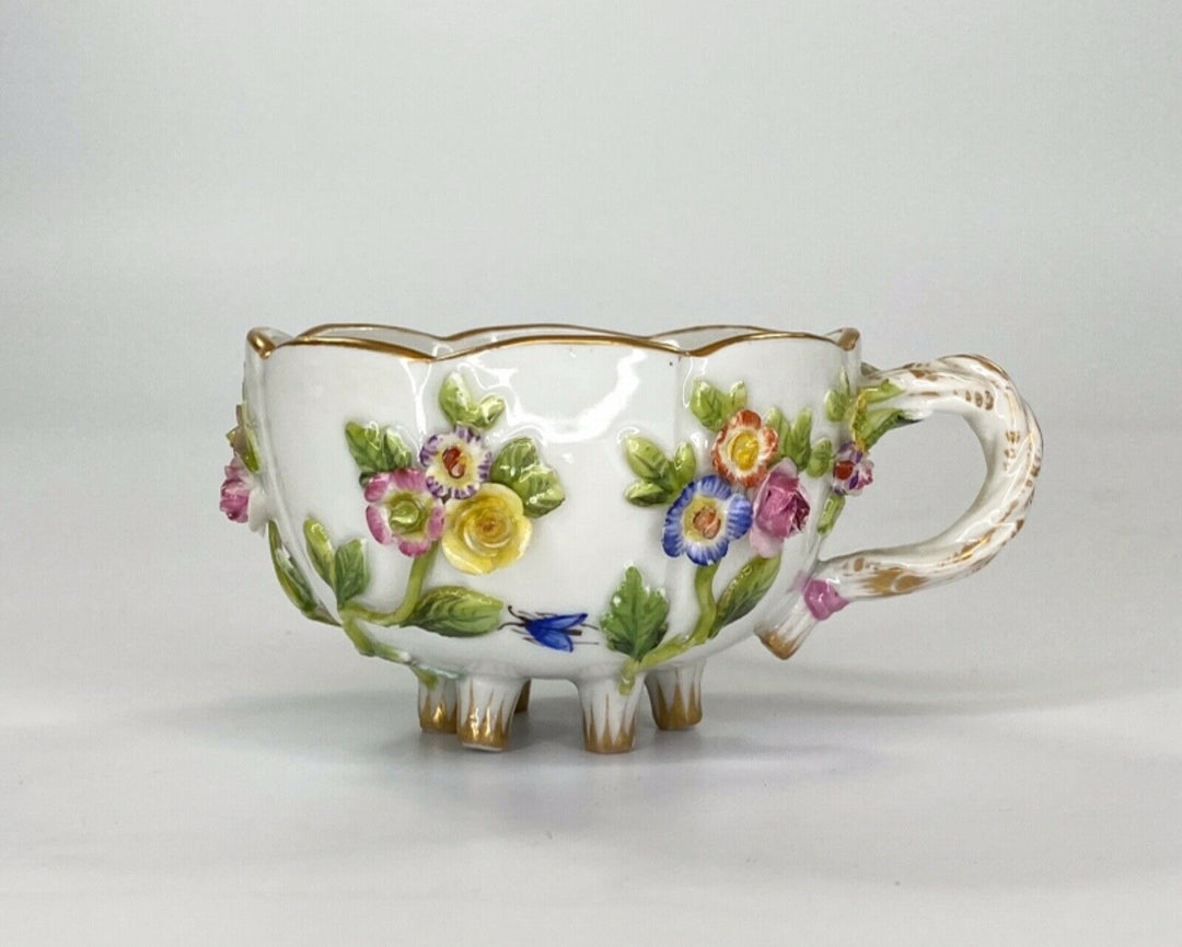 Meissen porcelain cup & saucer. Flower & Fruit encrusted, c. 1870.