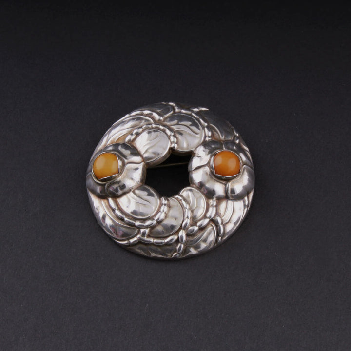 Georg Jensen Sterling Brooch # 42 with Amber. Design: GJ himself. VERY RARE.