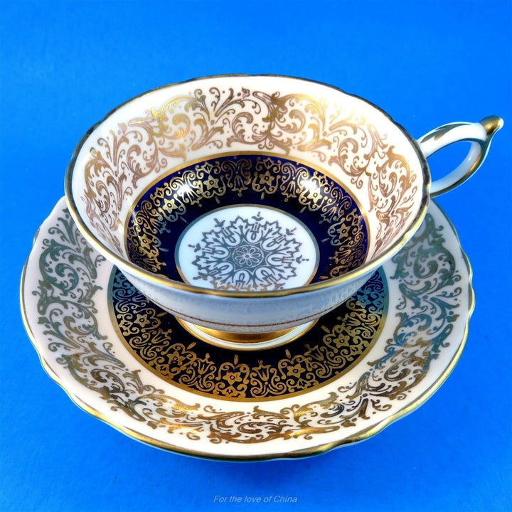 パラゴン　センターゴールドスターとピーチ＆コバルトボーダー　カップ&ソーサー