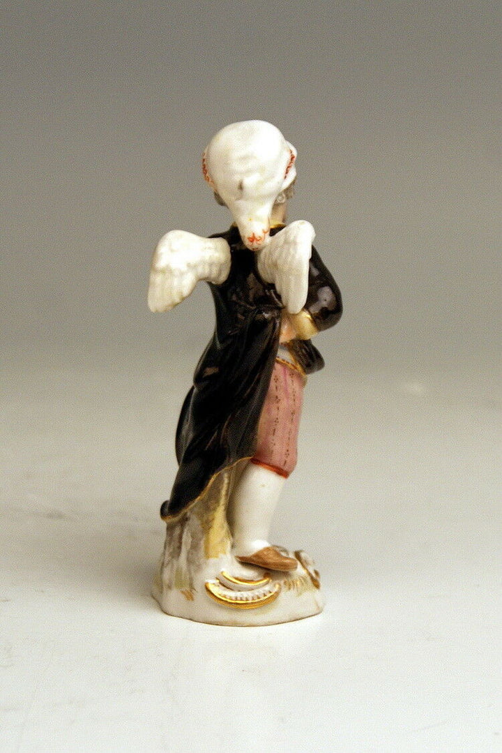 MEISSEN FIGUR VERKLEIDETE AMORETTE GEFLÜGELTER BÄRTIGER PUTTO MIT ZIPFELMÜTZE