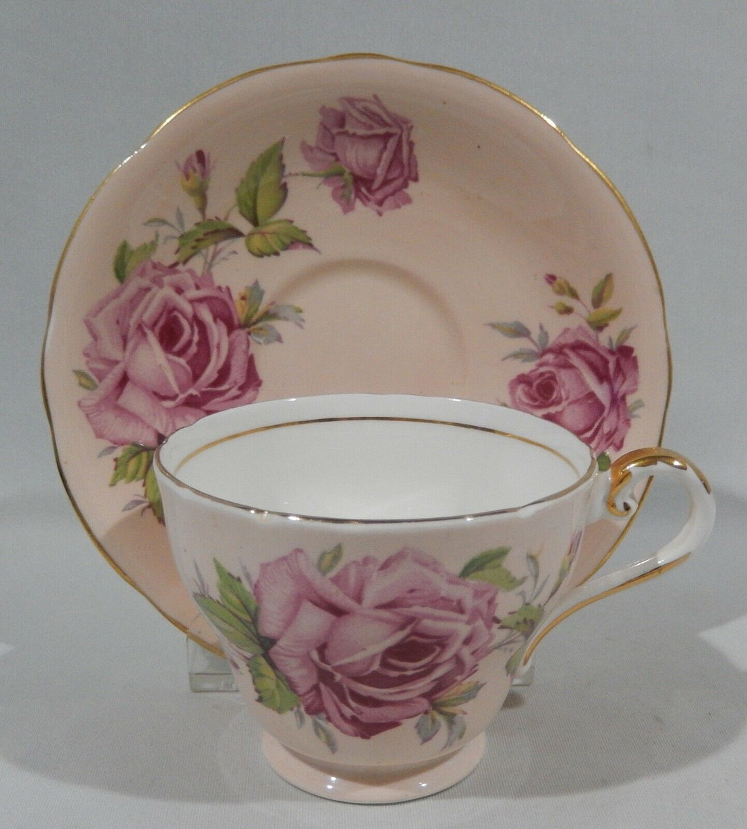 Vintage 1950s AYNSLEY PINK CABBAGE ROSE CUP & SAUCER on PALE PEACH BACKGROUND