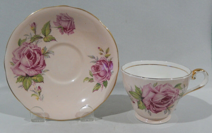 Vintage 1950s AYNSLEY PINK CABBAGE ROSE CUP & SAUCER on PALE PEACH BACKGROUND