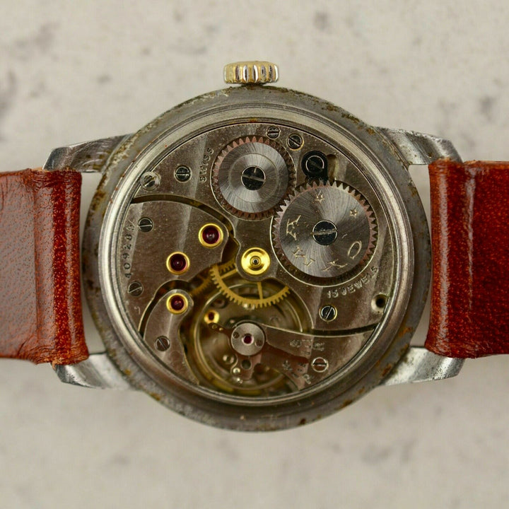 C.1945 Vintage CYMA Calatrava watch cal.234 in stainless steel