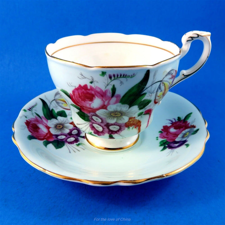 パラゴン　ライトブルー地とカラフルフローラルブーケのカップ&ソーサー