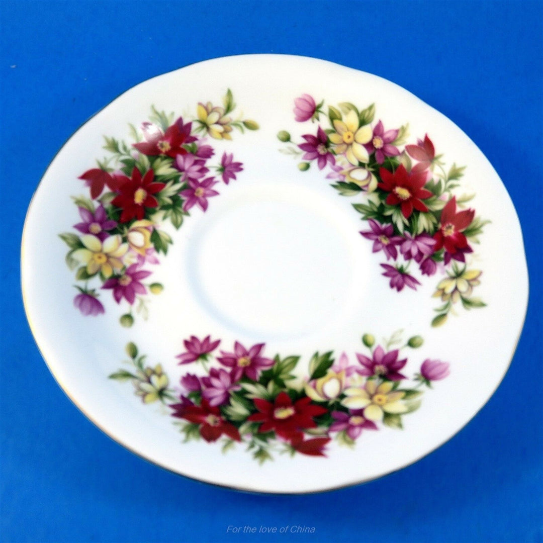 パラゴン　赤紫と黄色のフラワーフェスティバルのカップ&ソーサー