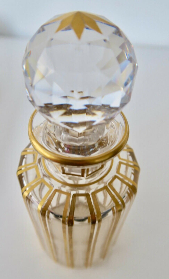 Ancien flacon de toilette en cristal de Baccarat cannelures or Hauteur env 19 cm