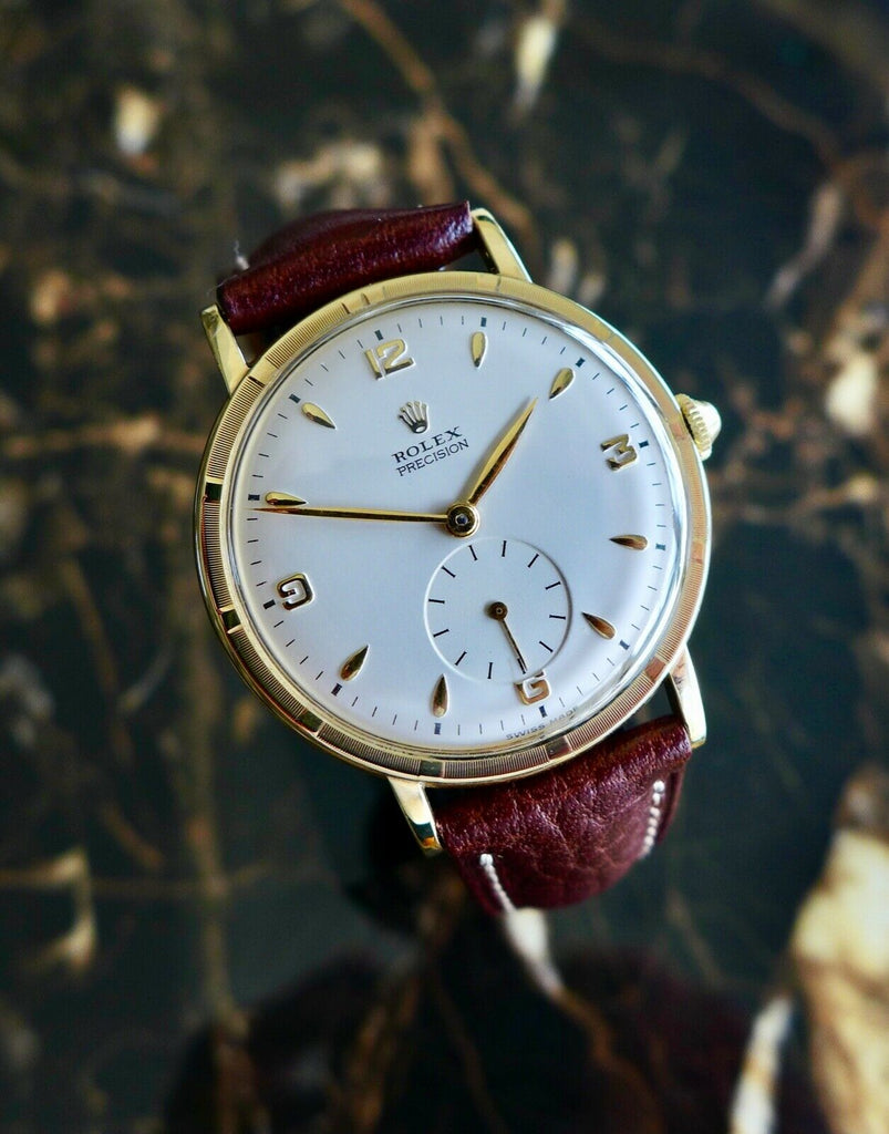 ロレックス“メトロポリタン” ヴィンテージ 1953年製 男性用腕時計 オーバーサイズ(35ｍｍ) ゴールド／スチール製 – アンティークテーブルウェア