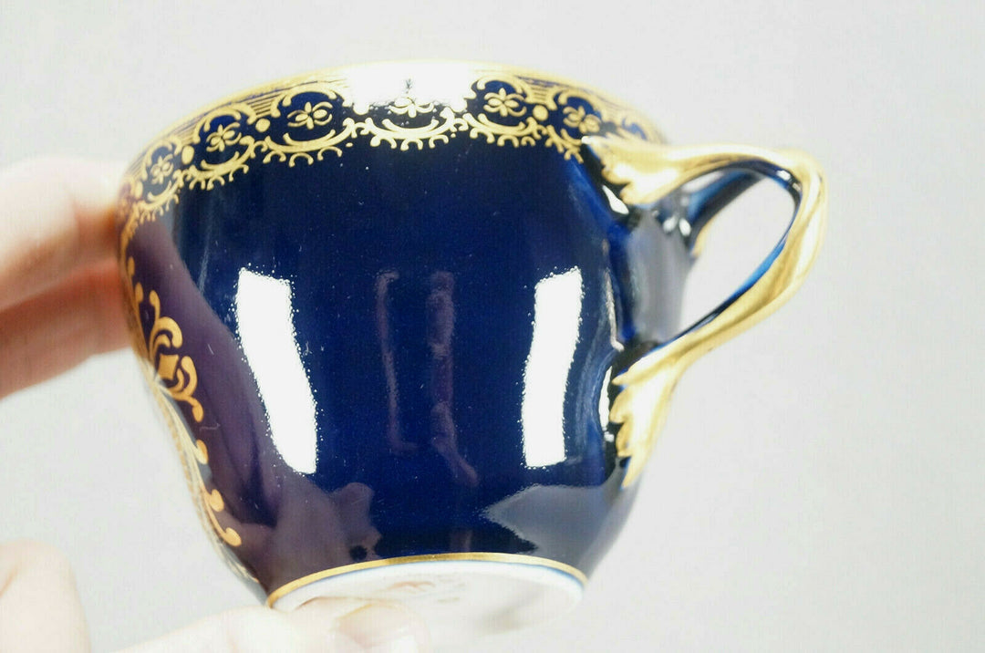 KPM Berlin Hand Painted Floral Cobalt & Gold Entwined Handle Tea Cup & Saucer C