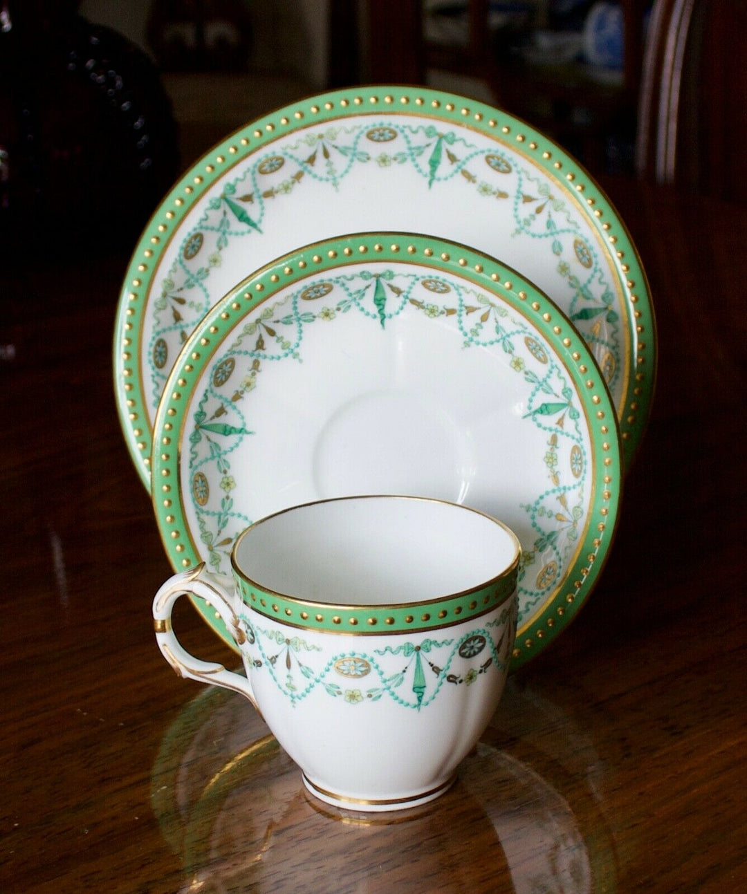 MINTON PORCELAIN TRIO - 1889 MARK - GREEN, GILT AND BLUE ENAMEL SWAGGING ETC.