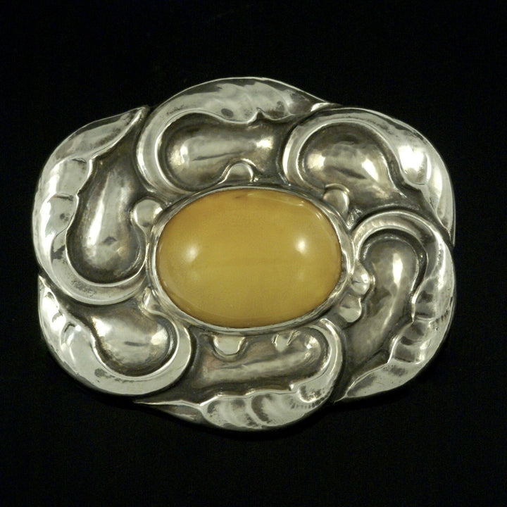 Georg Jensen. Art Nouveau Sterling Silver Brooch with Amber #61. 1933-44.