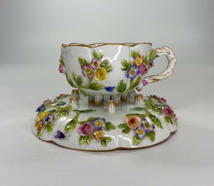 Meissen porcelain cup & saucer. Flower & Fruit encrusted, c. 1870.