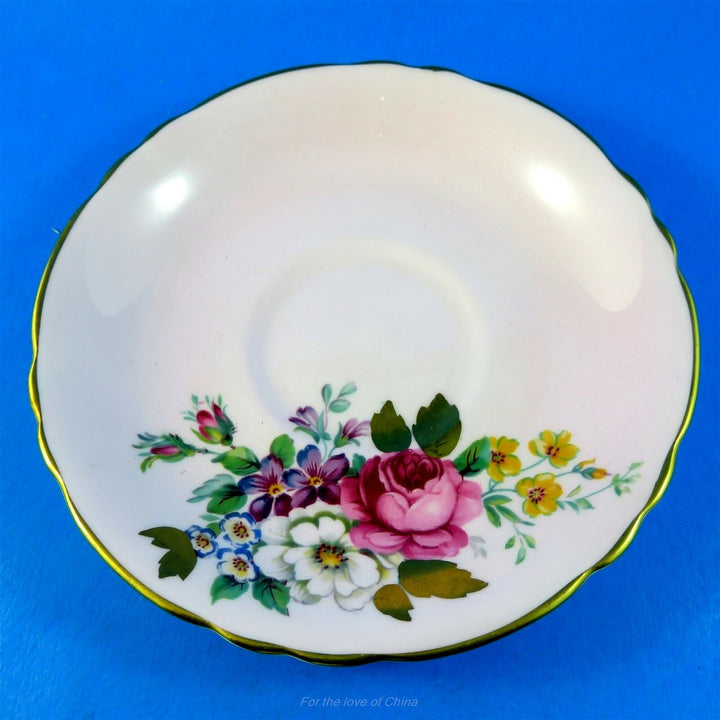 パラゴン　淡いピンク地に煌めくゴールドブーケ　カップ&ソーサー