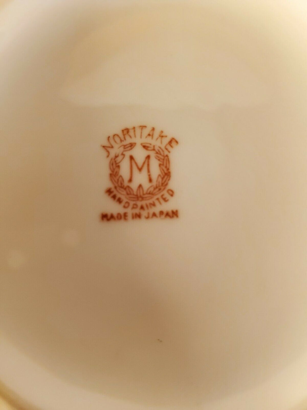 オールドノリタケ ラスター加工されたオレンジと白のカップ