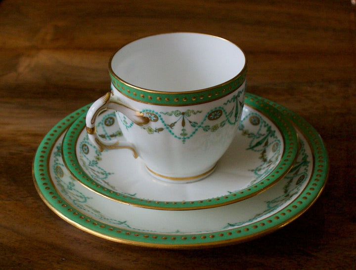MINTON PORCELAIN TRIO - 1889 MARK - GREEN, GILT AND BLUE ENAMEL SWAGGING ETC.