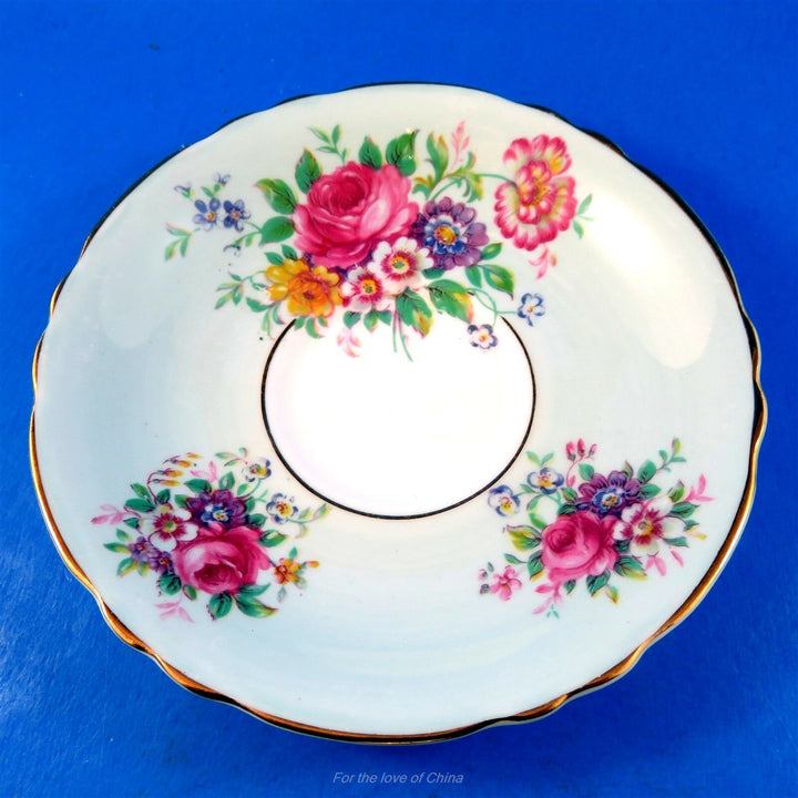 パラゴン　ライトブルー地に輝くフローラルブーケ　カップ&ソーサー