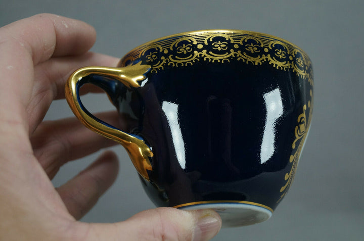 KPM Berlin Hand Painted Floral Cobalt & Gold Entwined Handle Tea Cup & Saucer C