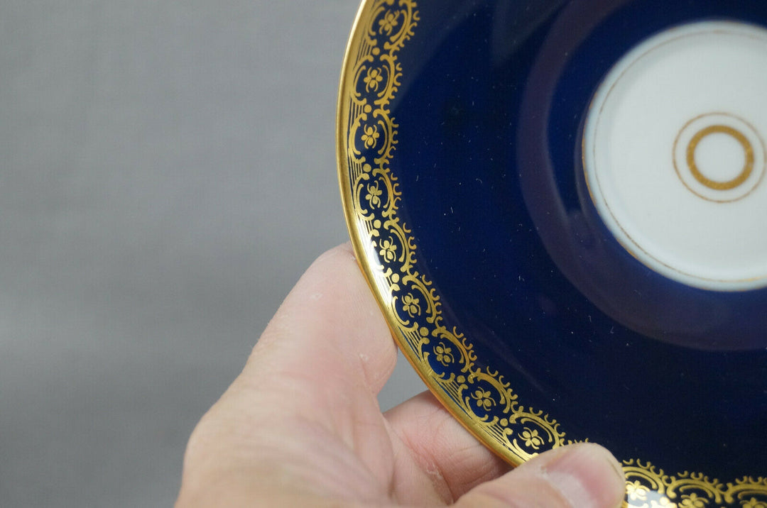 KPM Berlin Hand Painted Floral Cobalt & Gold Entwined Handle Tea Cup & Saucer C