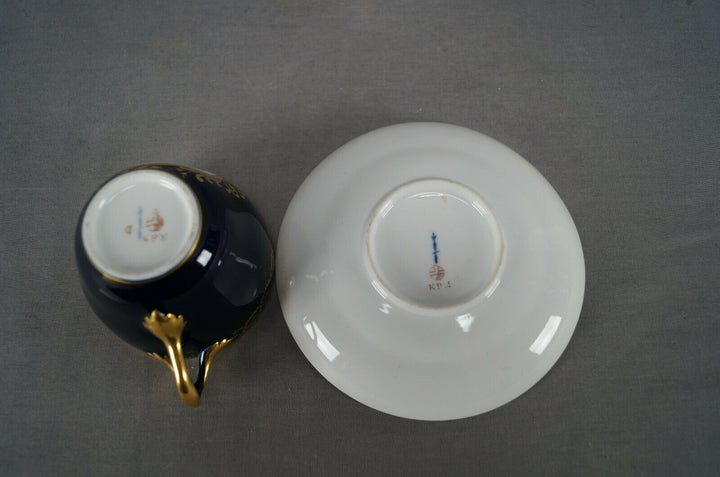 KPM Berlin Hand Painted Floral Cobalt & Gold Entwined Handle Tea Cup & Saucer C