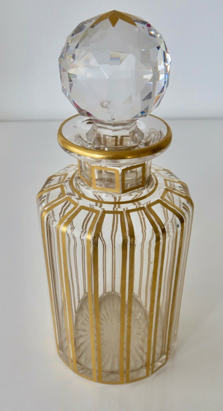 Ancien flacon de toilette en cristal de Baccarat cannelures or Hauteur env 19 cm