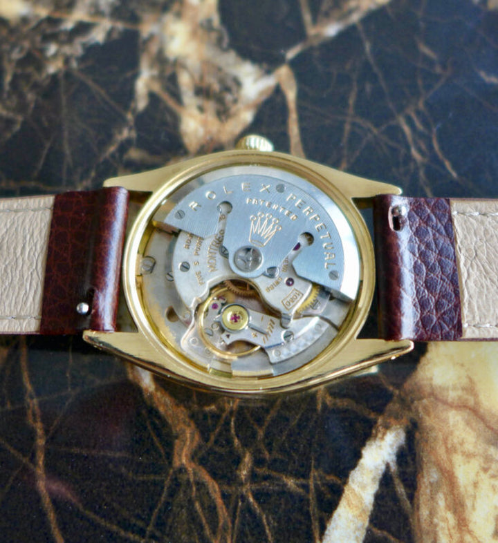 A STUNNING GENTS VINTAGE 1955 ROLEX OYSTER PERPETUAL WATCH IN 18K GOLD REF 6567