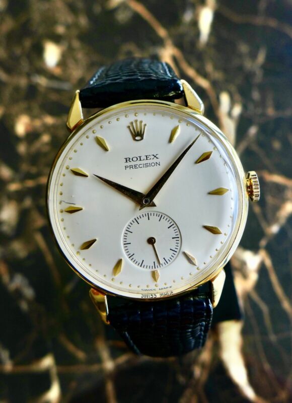 A BEAUTIFUL VINTAGE 1950s GENTS ROLEX PRECISION WITH FANCY LUGS IN 18K GOLD