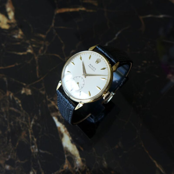 A BEAUTIFUL VINTAGE 1950s GENTS ROLEX PRECISION WITH FANCY LUGS IN 18K GOLD