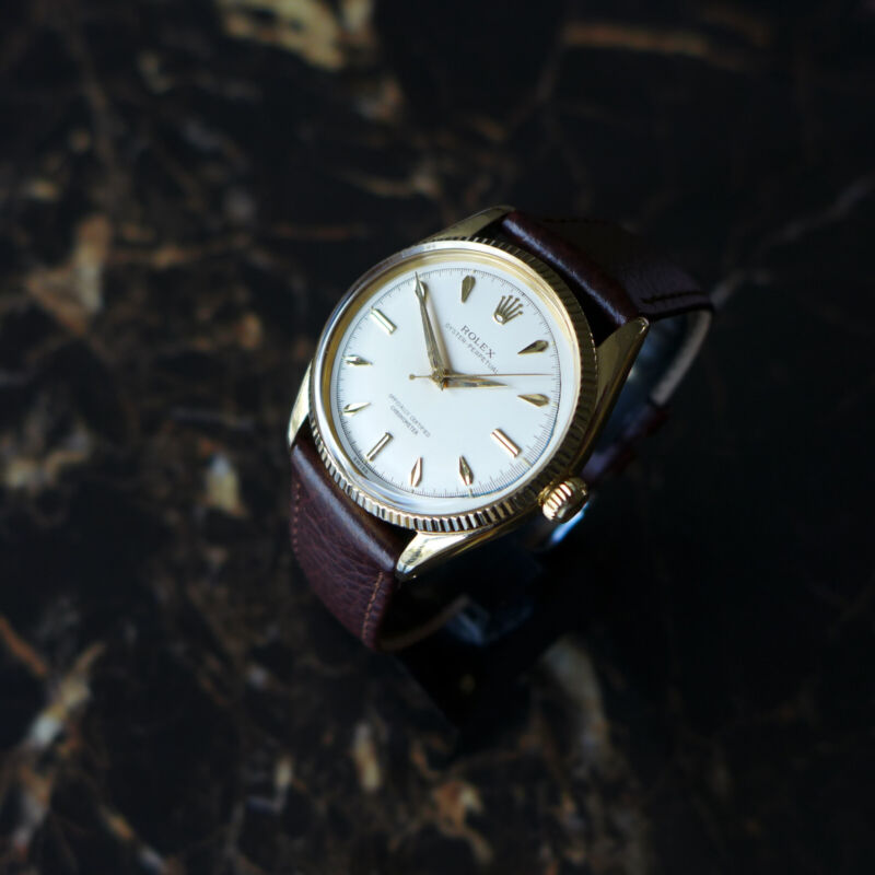 A STUNNING GENTS VINTAGE 1955 ROLEX OYSTER PERPETUAL WATCH IN 18K GOLD REF 6567
