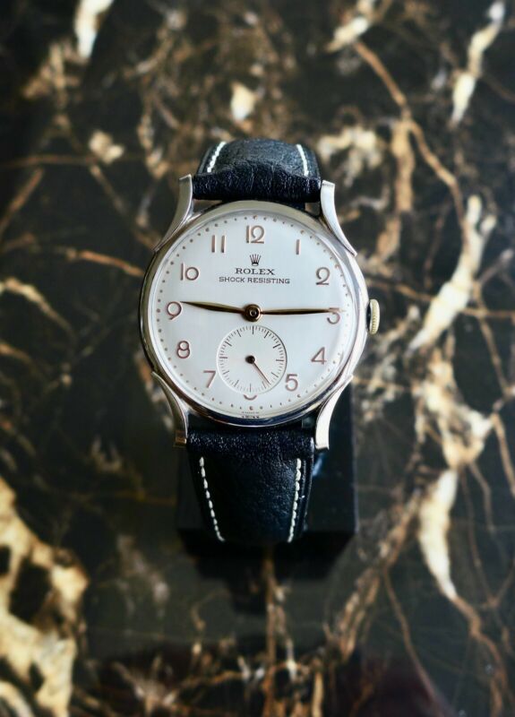A BEAUTIFUL VINTAGE 1946 MID-SIZE ROLEX PRECISION WATCH WITH FANCY LUGS IN STEEL