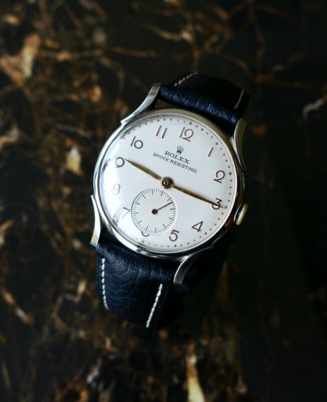 A BEAUTIFUL VINTAGE 1946 MID-SIZE ROLEX PRECISION WATCH WITH FANCY LUGS IN STEEL