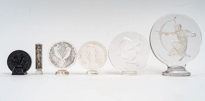 René Lalique: ""Fauna"" seal in pressed white molded glass-