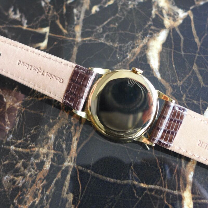 A BEAUTIFUL VINTAGE 1947 GENTS ROLEX PRECISION WITH LARGE HORN LUGS IN 18K GOLD