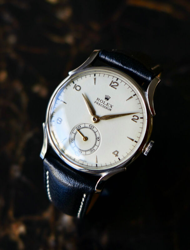 A BEAUTIFUL VINTAGE 1946 MID-SIZE ROLEX PRECISION WATCH WITH FANCY LUGS IN STEEL