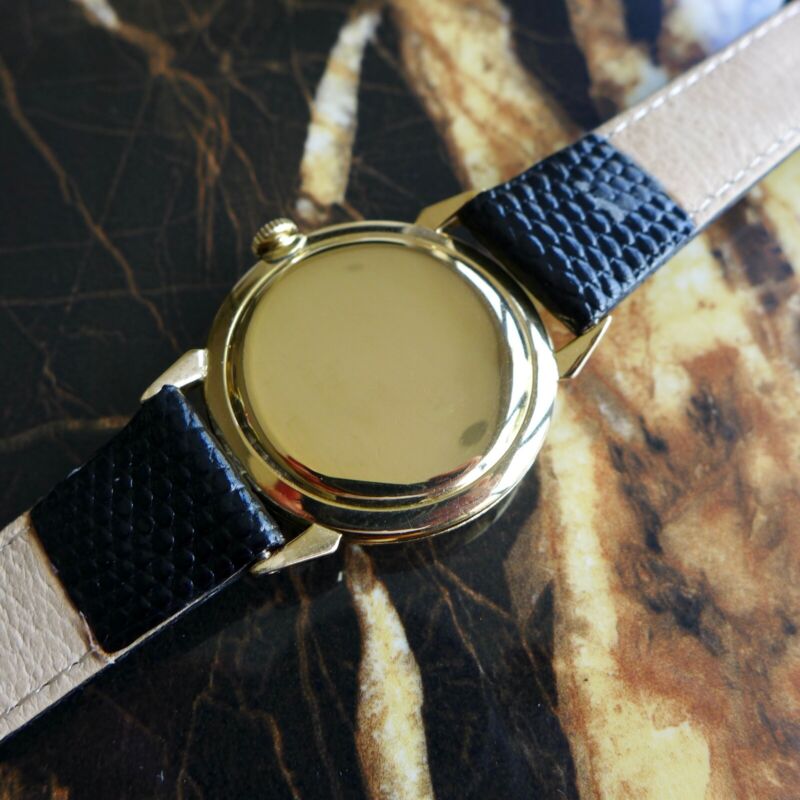 A BEAUTIFUL VINTAGE 1950s GENTS ROLEX PRECISION WITH FANCY LUGS IN 18K GOLD