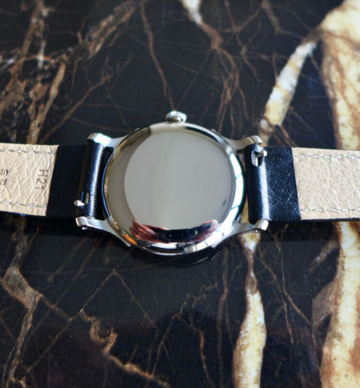 A BEAUTIFUL VINTAGE 1946 MID-SIZE ROLEX PRECISION WATCH WITH FANCY LUGS IN STEEL