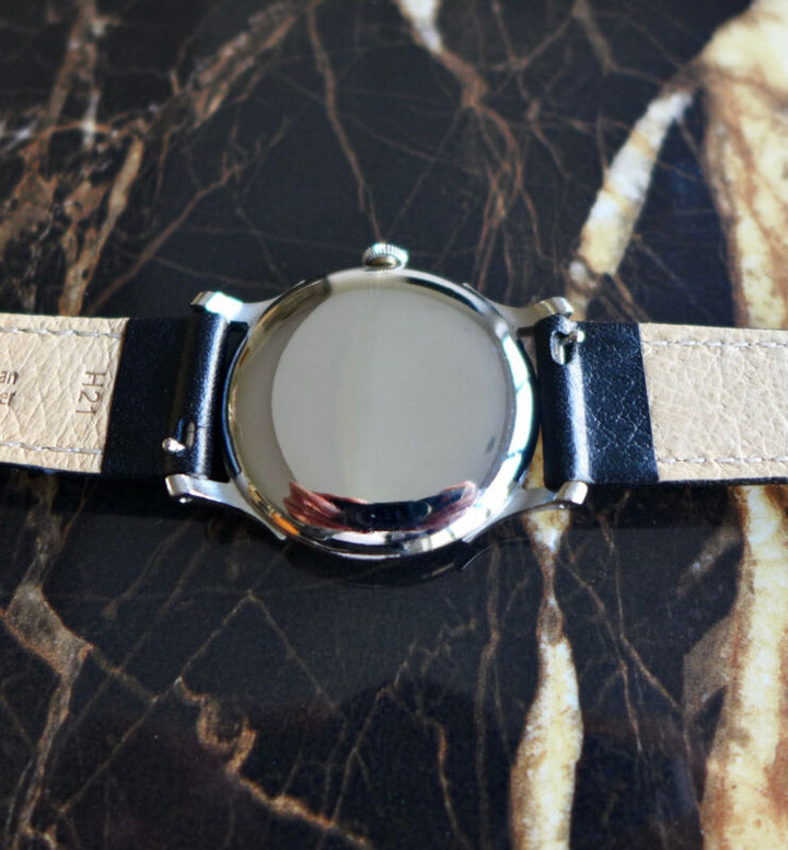 A BEAUTIFUL VINTAGE 1946 MID-SIZE ROLEX PRECISION WATCH WITH FANCY LUGS IN STEEL
