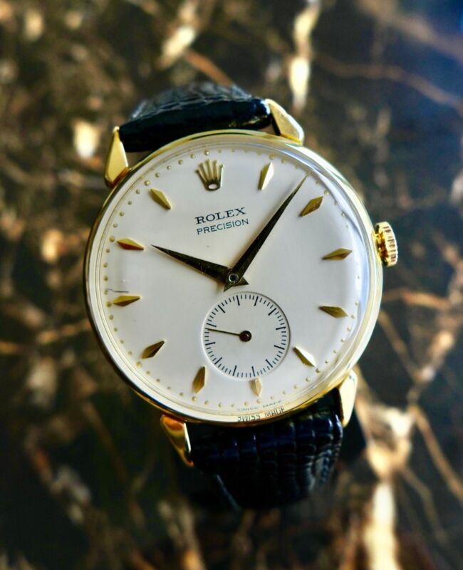 A BEAUTIFUL VINTAGE 1950s GENTS ROLEX PRECISION WITH FANCY LUGS IN 18K GOLD