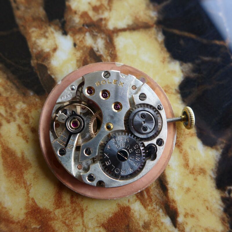 A BEAUTIFUL VINTAGE 1946 MID-SIZE ROLEX PRECISION WATCH WITH FANCY LUGS IN STEEL