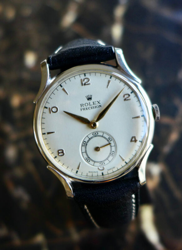 A BEAUTIFUL VINTAGE 1946 MID-SIZE ROLEX PRECISION WATCH WITH FANCY LUGS IN STEEL